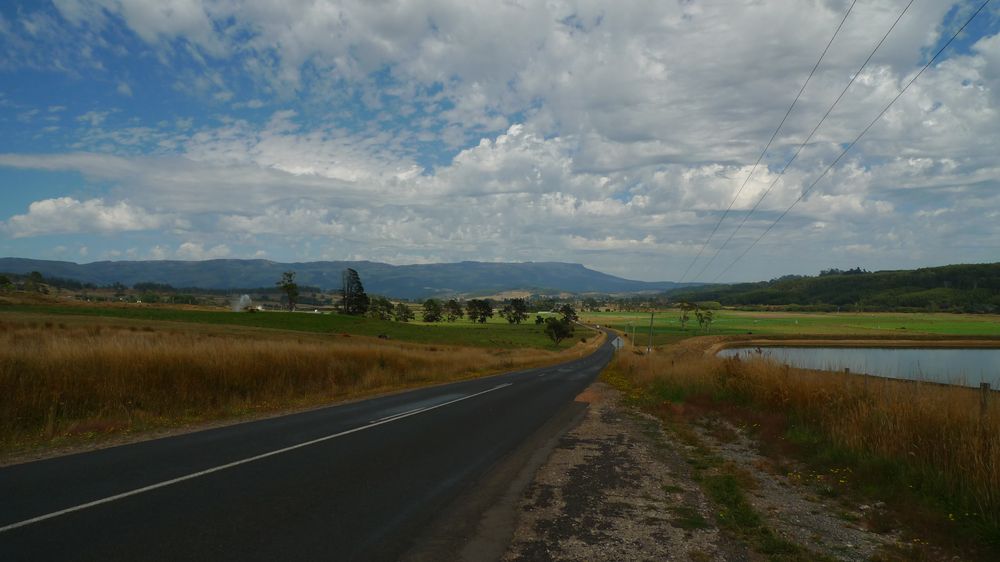 The view from Needles scenic lookout of the plains leading down to Chudleigh with Great Western Tiers in the background