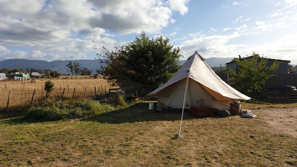 Our Bell tent was moved to the back of the property, so the cranes could move the train.
