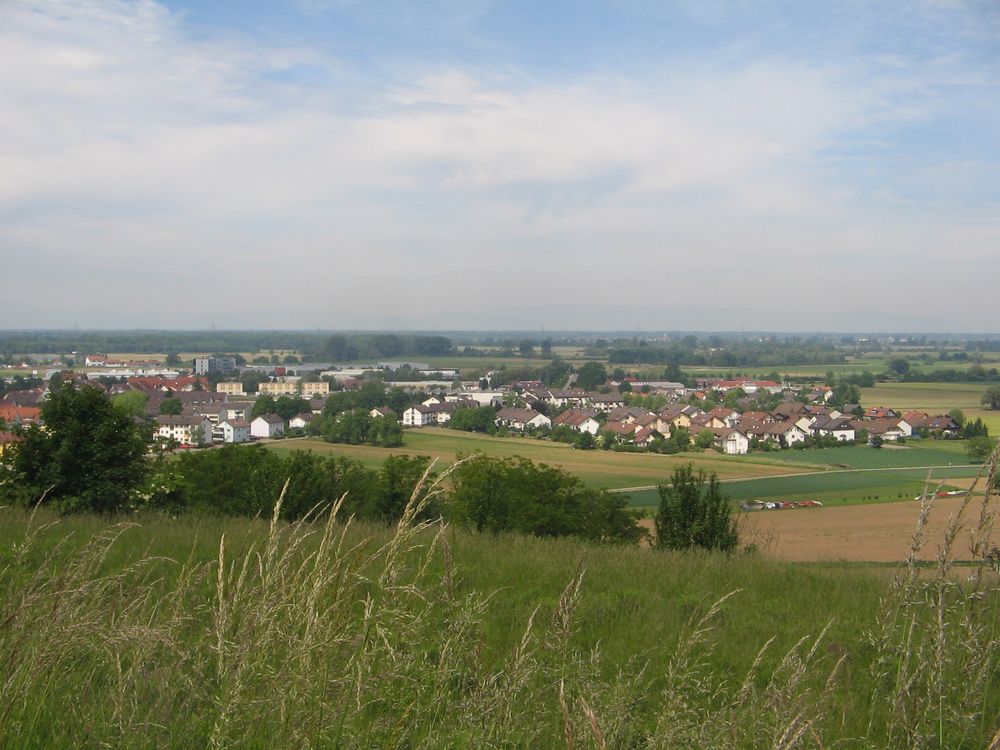 The green fields in the foreground were empty in 2009, now they are packed with apartment buildings and the like, signalling how fast this region has grown in ten years.