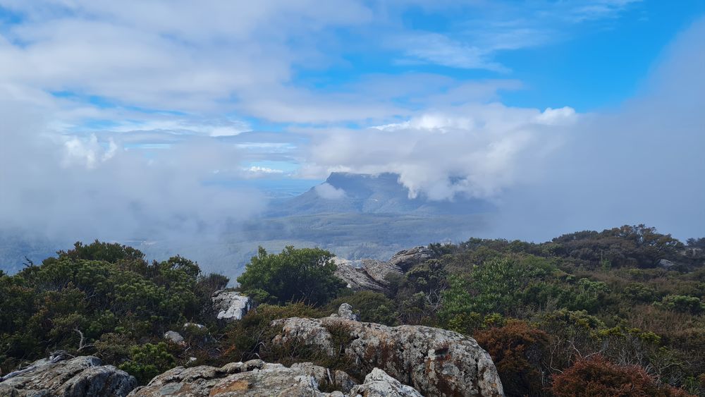 A break in the clouds for a couple of seconds reveals part of Projection Bluff