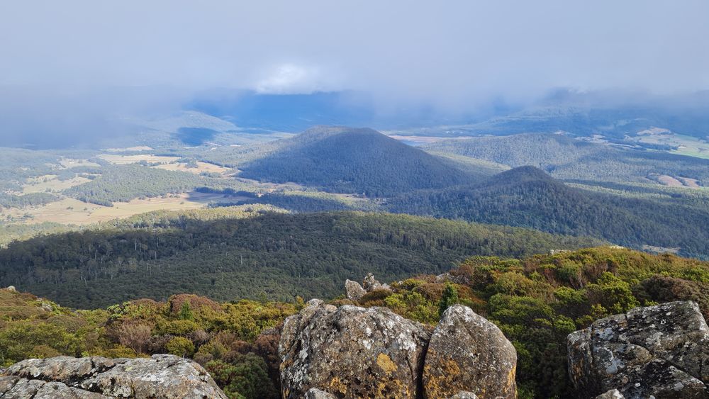 View of the flat plain of Jackey's Marsh in the foreground and Meander Dam behind Warners Sugarloaf and Archers Sugarloaf (the smaller mountain)