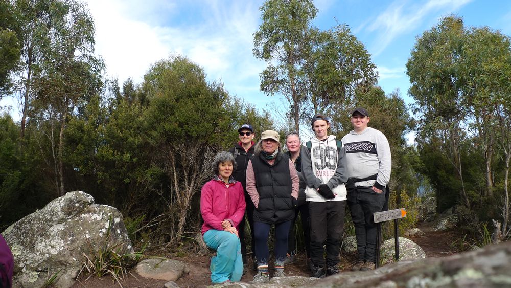 Map of Tassians posing for a group photo.